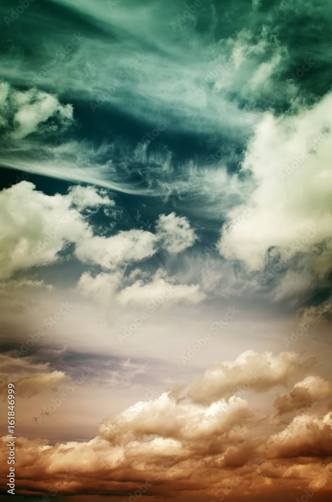 Obraz premium Fog and clouds looking up into a fantasy evening sky. Image looks antique, In red and blue colors