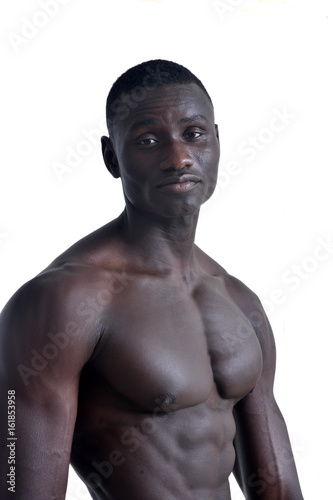 portrait of a muscular african man on white