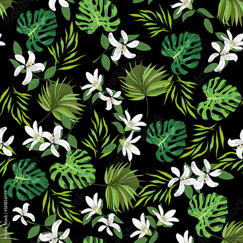 Seamless vector pattern of hand drawn flowers and leaves. Tropical background.