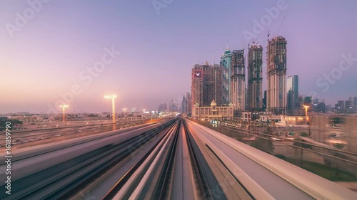 Journey on fully automated metro rail network in Dubai, UAE. The view through the front window. Dubai is a city and emirate in United Arab Emirates photo
