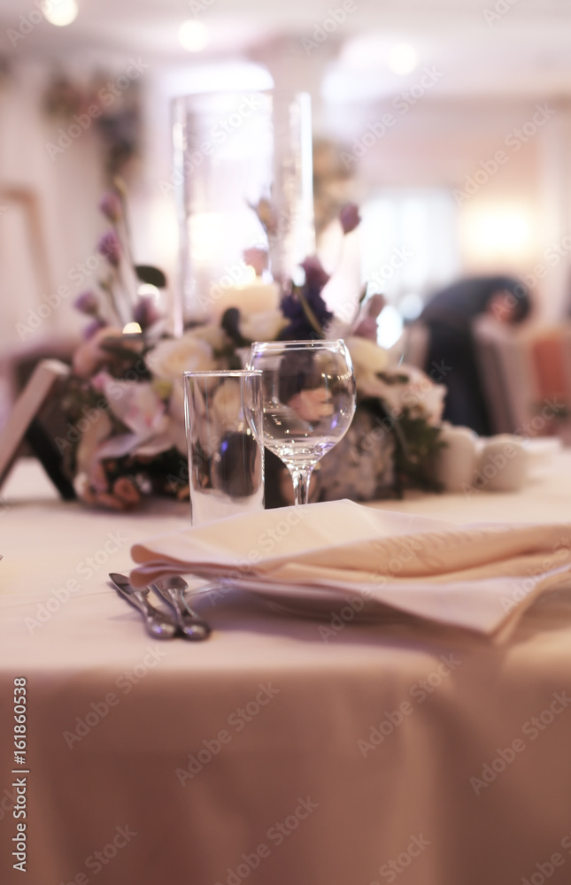 Wine glasses on the table served for the reception in the restaurant