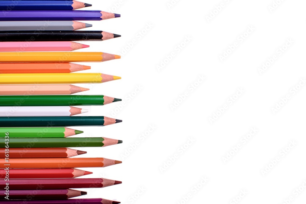 Many colored pencils isolated on white background, place for text Many colored pencils isolated on white background, place for text