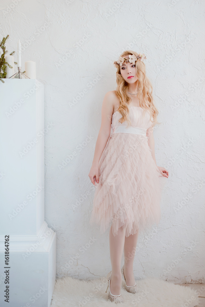 picture of young blonde woman wearing wreath of flowers, spring tender and romantic portrait, fashion retouched shot