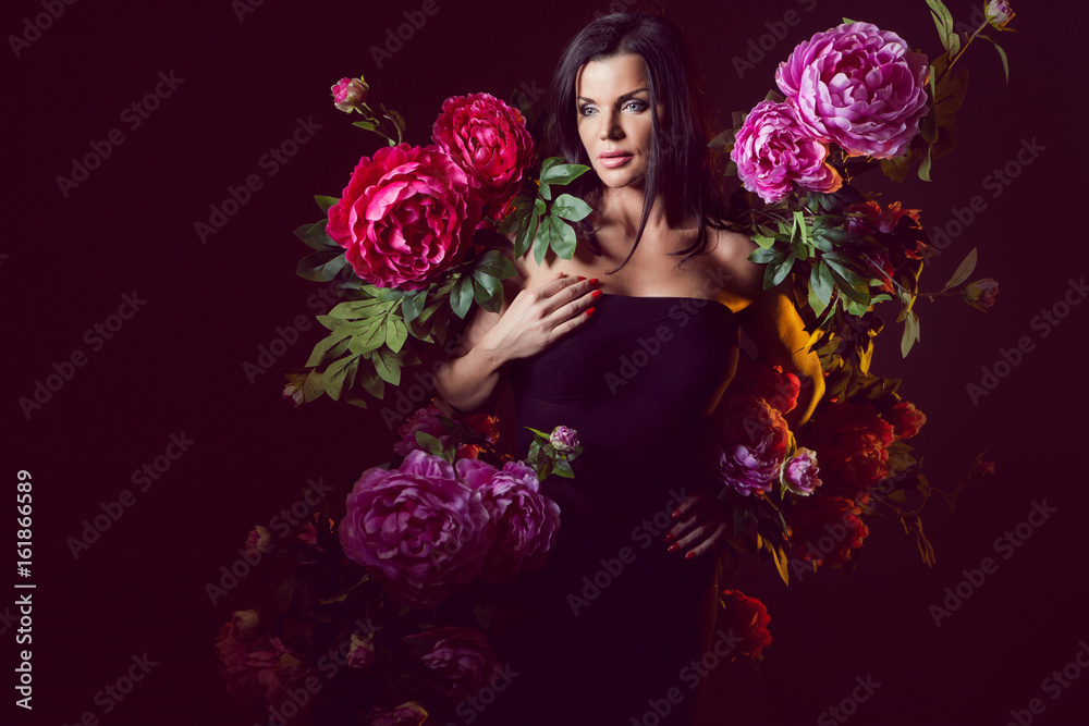 Girl in flowers. Girl surrounded by flowers. Girl in peonies. Peony flowers. Girl in flowers. Girl surrounded by flowers. Girl in peonies. Peony flowers.