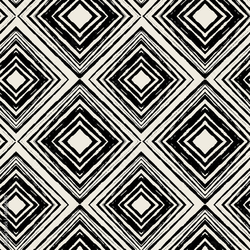 Seamless repeating textile ink brush strokes pattern in doodle grunge texture style.