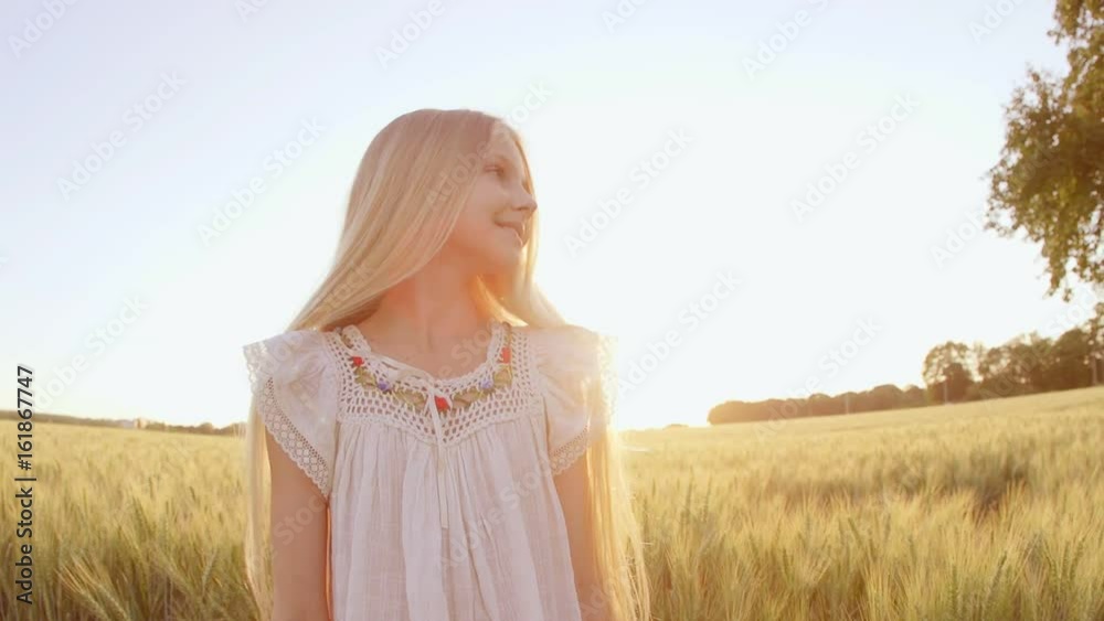 Portrait Adorable Little Girl Smiles outdoor at sunset Portrait Adorable Little Girl Smiles outdoor at sunset
