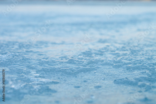 winter background blue ice texture closeup