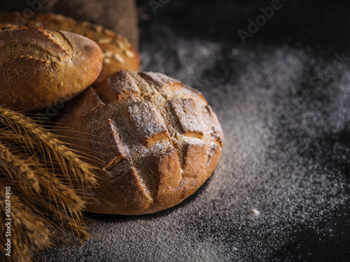 Canvas Print Different kinds of bread on background.