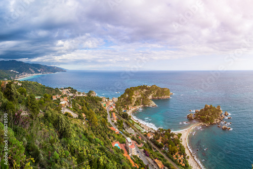 Taormina, Sicily - Beautiful landscape view of Mazzaro and Isola Bella Sicilian island of the mediterranean with beach and turquoise sea water