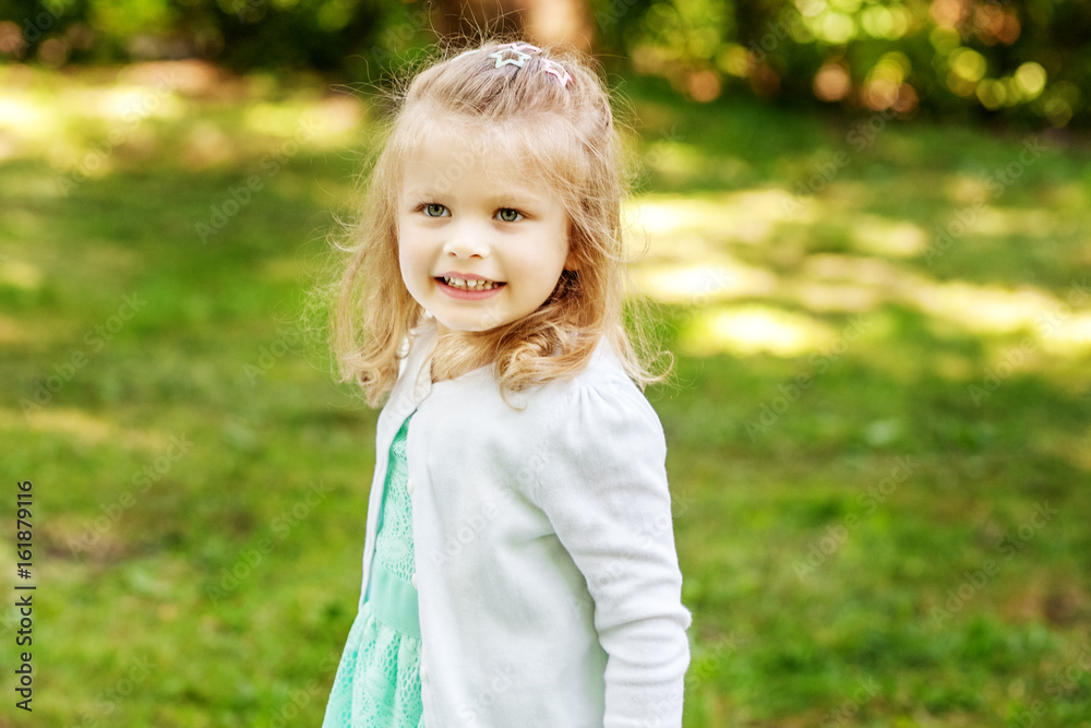 Beautiful girl walking in the park. Preschool child. 2-3 years. The concept of childhood and lifestyle. Beautiful girl walking in the park. Preschool child. 2-3 years. The concept of childhood and lifestyle.