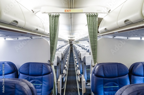 View of the interior from the business class, and view of the economy class in the plane.