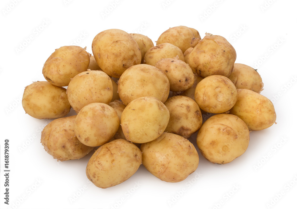 Heap of a new potato tubers isolated on white background. Heap of a new potato tubers isolated on white background.
