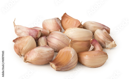 Cloves of fresh young garlic isolated on white background