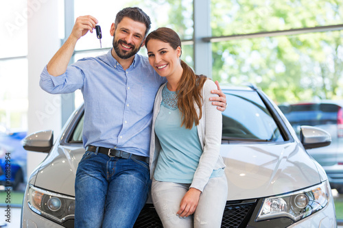 Young couple buying a car
