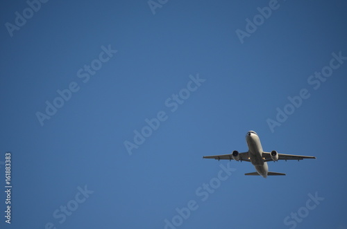 Commercial Airplane Flying Upwards