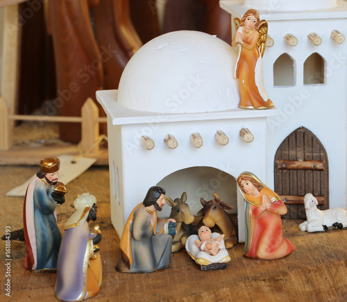Palestinian nativity scene with holy family set in the middle ea photo