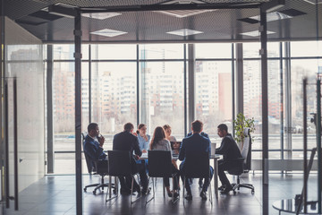 Group of business people with businessman leader on foreground