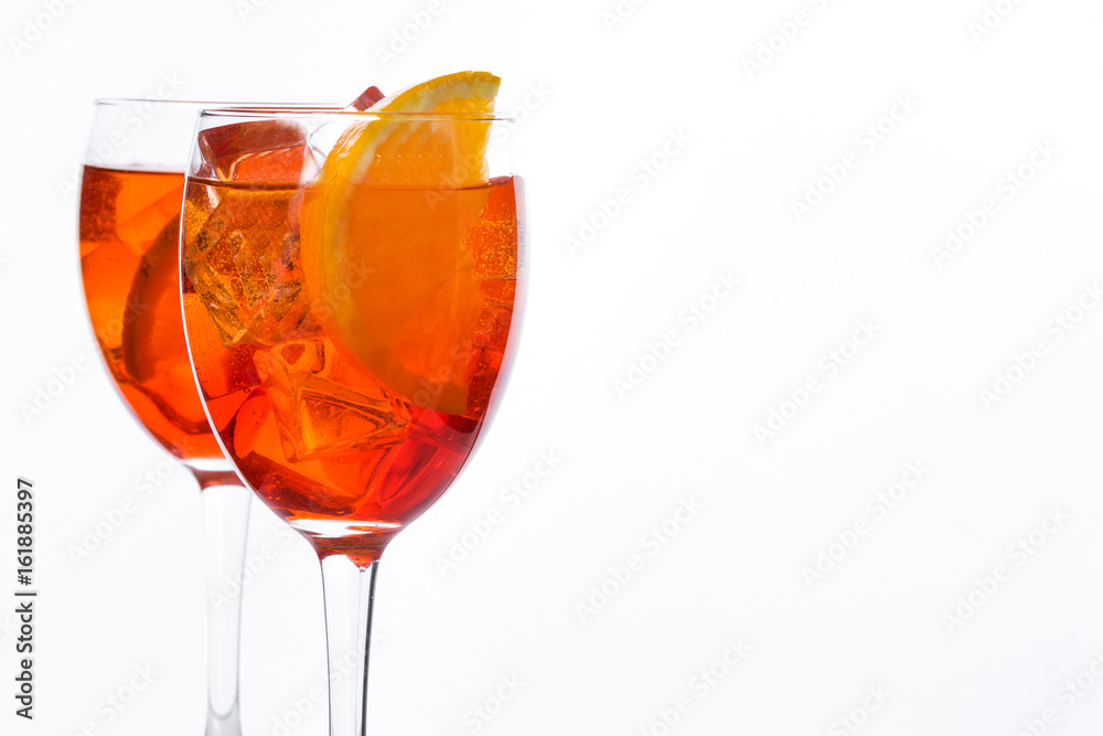 Aperol spritz cocktail in glass isolated on white background
Aperol spritz cocktail in glass isolated on white background