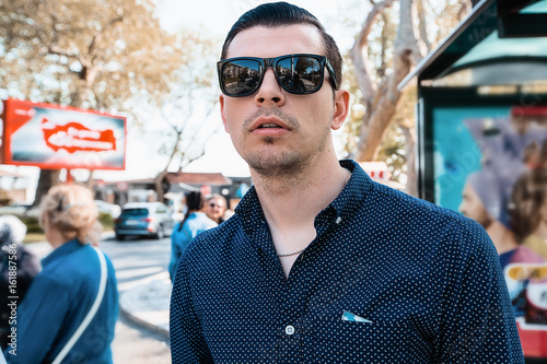 close up portrait man in sunglasses