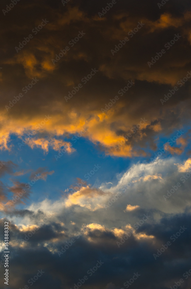 Dramatic sunset sky with colorful clouds after thunderstorm