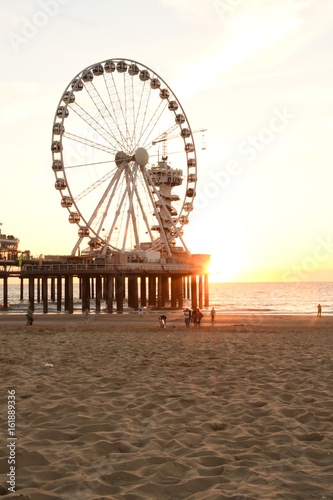 Den Haag, Jun 2017: Pier in Scheveningen at the sunset