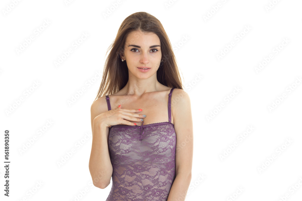 Beautiful young girl in pink body underwear looks at the camera Beautiful young girl in pink body underwear looks at the camera