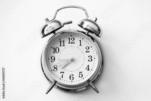 Alarm clock on white background