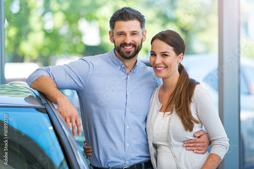 Young couple buying a car
