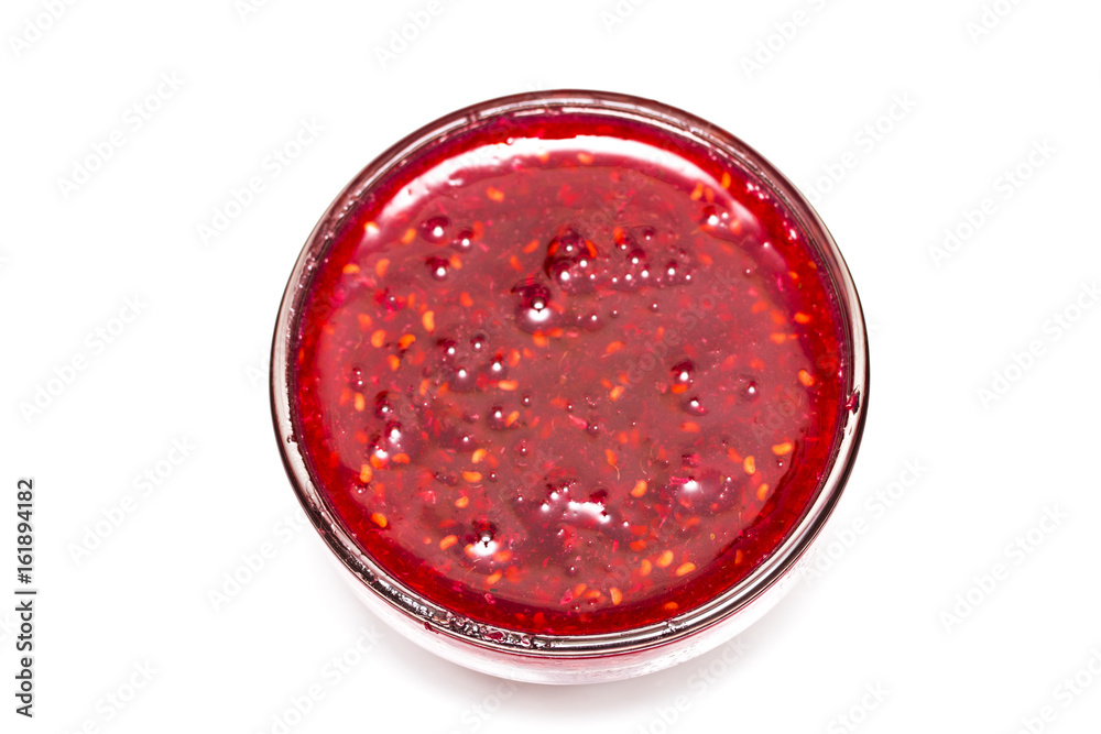 raspberry jam glass isolated on a white background raspberry jam glass isolated on a white background