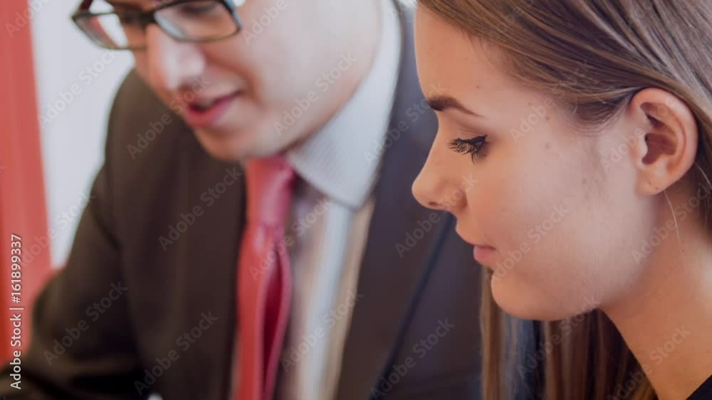Close up of business people working in office and smiling