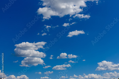 Beautiful blue sky with white clouds. Wide angle view.