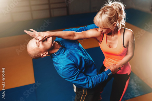 Fotografiet Women self defense technique, martial art