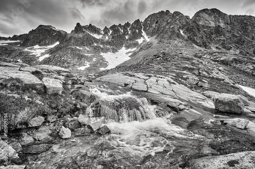 Black and white picture of a stream in High Tatra Mountains, Slovakia.akia.