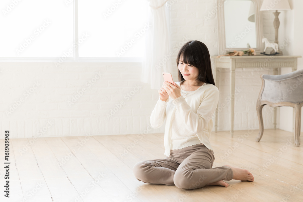 attractive asian woman using smart phone attractive asian woman using smart phone