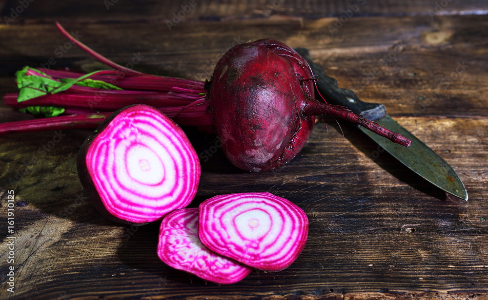 Raw red beets are cut into pieces Raw red beets are cut into pieces