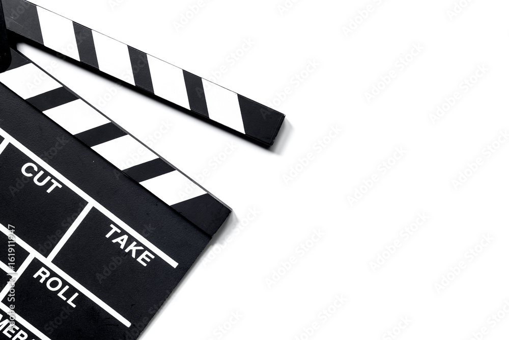 Movie clapperboard on white background top view copyspace