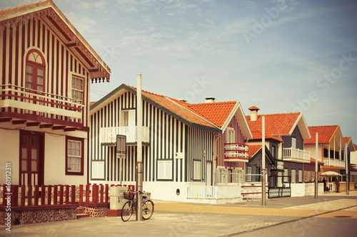 Bicycle on striped little houses street