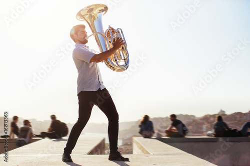 Canvas Print Street musician playing tuba outdoor