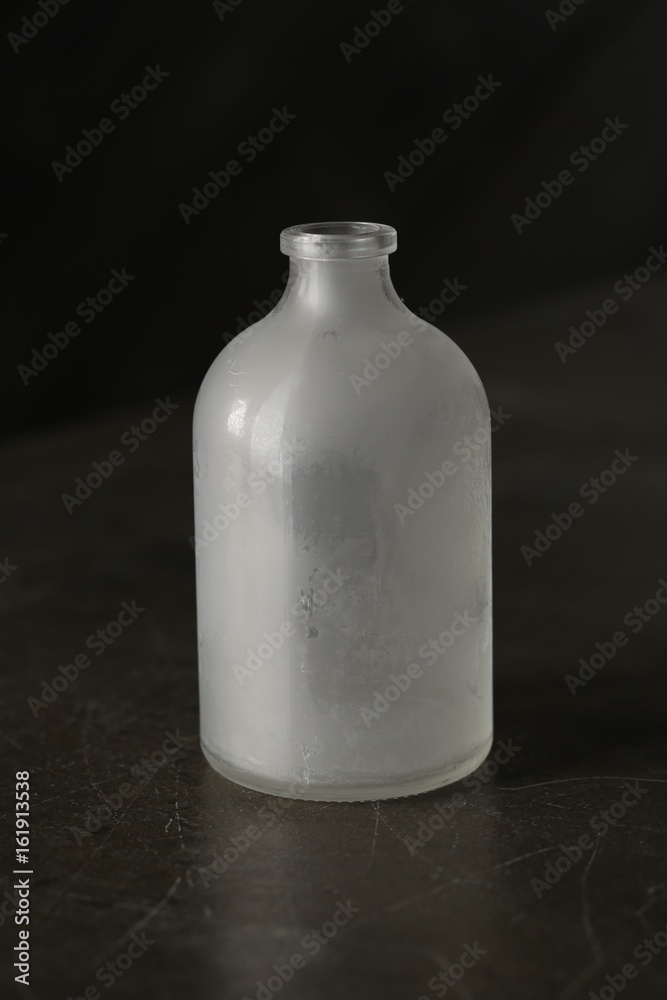 Jar is full of smoke. Black background. Close up Jar is full of smoke. Black background. Close up