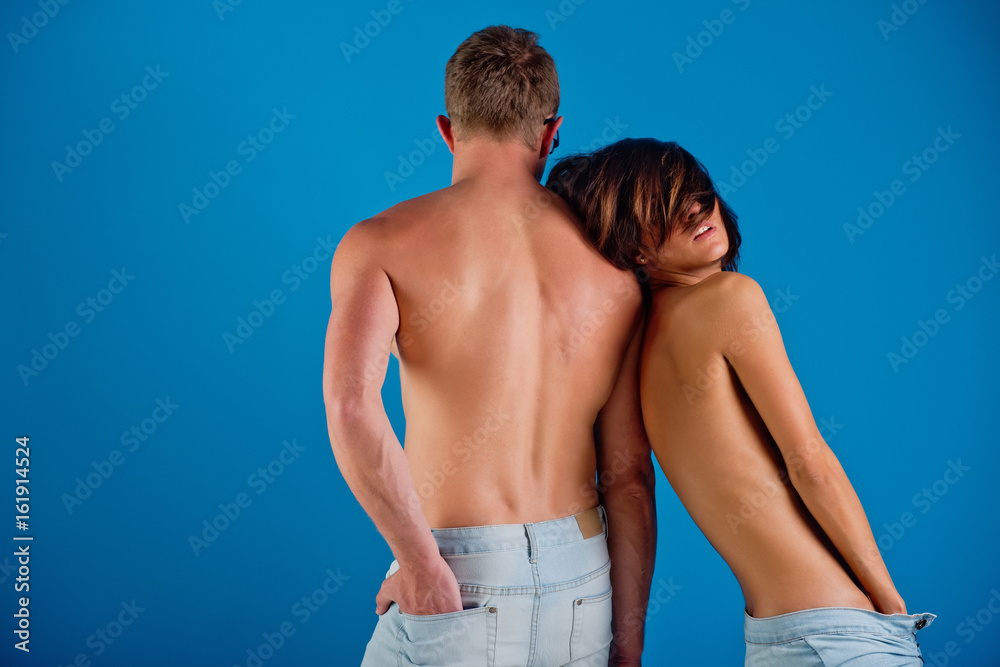 couple of man and woman in stylish jeans couple of man and woman in stylish jeans