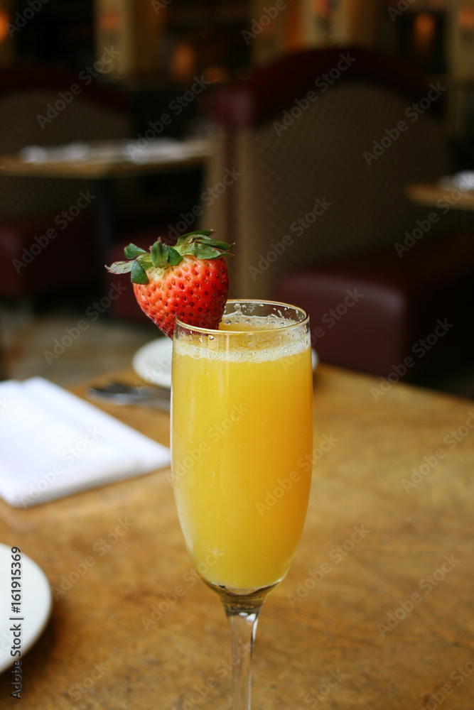 Single mimosa cocktail glass, above, vertical Single mimosa cocktail glass, above, vertical