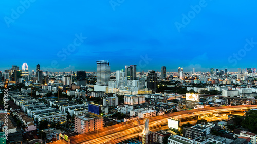 Cityscape and light of night road in long exposure