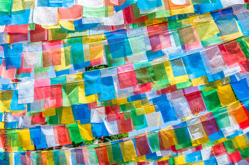 Colorful Tibetan prayer flags in the Tibetan village which is located at Yunnan Nationalities Village, China.
