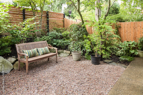 Fotografia, Obraz Comfortable urban backyard with bench