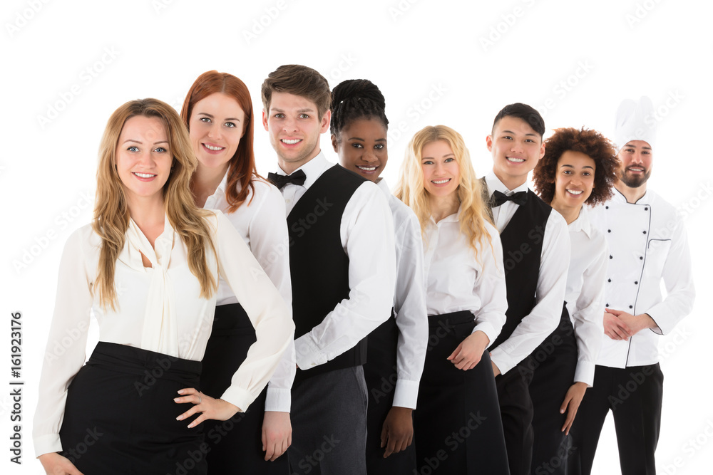 Confident Restaurant Staff Standing In Row Confident Restaurant Staff Standing In Row