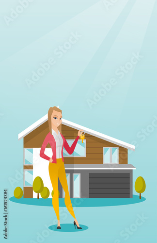 Young caucasian homeowner with key.