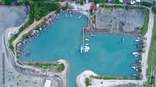 Aerial view of fisherman village marina on the tropical island  © Nopporn