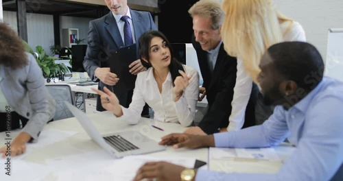 Group Of Business People Cheering For Good Results Clappping Hands During Meeting In Office, Successful Team Discussing Reports Slow Motion 60