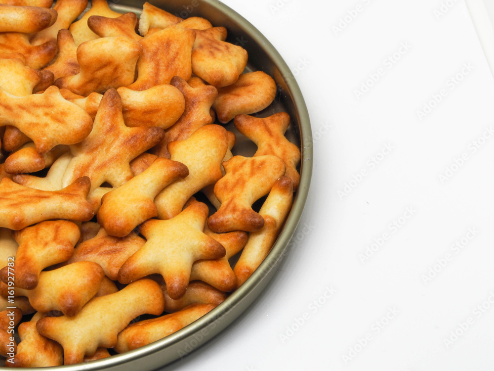 Star and fishes biscuits white background isolated close up Star and fishes biscuits white background isolated close up