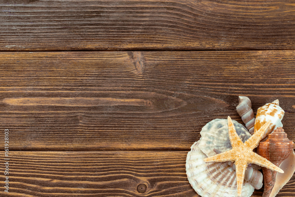 Fototapeta premium Beach accessories on wooden board